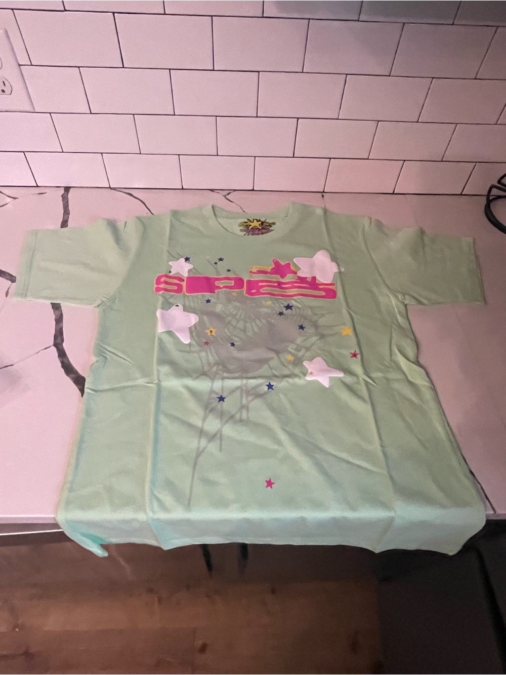 Mens Designer Tee Size S.